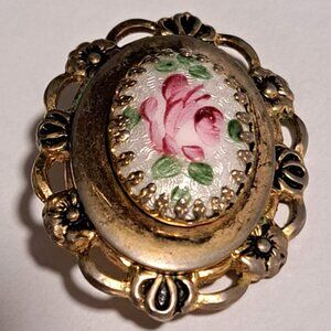 vintage gold tone brooch with a pink red painted rose design